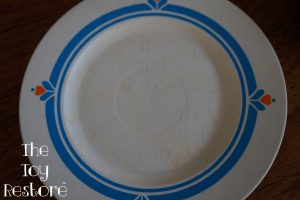 Bleaching yellow toys, Fisher Price Fun with Food dish, got blotchy from not having an even coat.